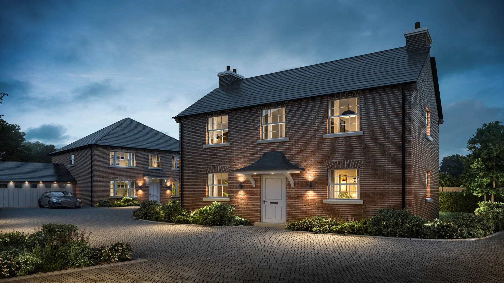 CGI of Mottisfont at dusk, featuring two of the six luxury countryside homes in Houghton, Stockbridge, Hampshire, with warm interior lighting visible through the windows.